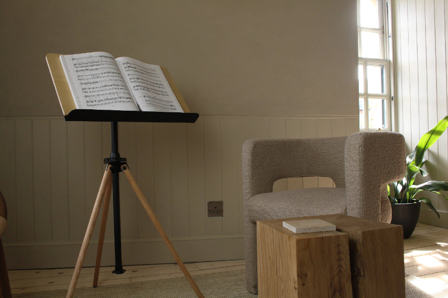 Grandstand Tripod 24 music stand holding sheet music book