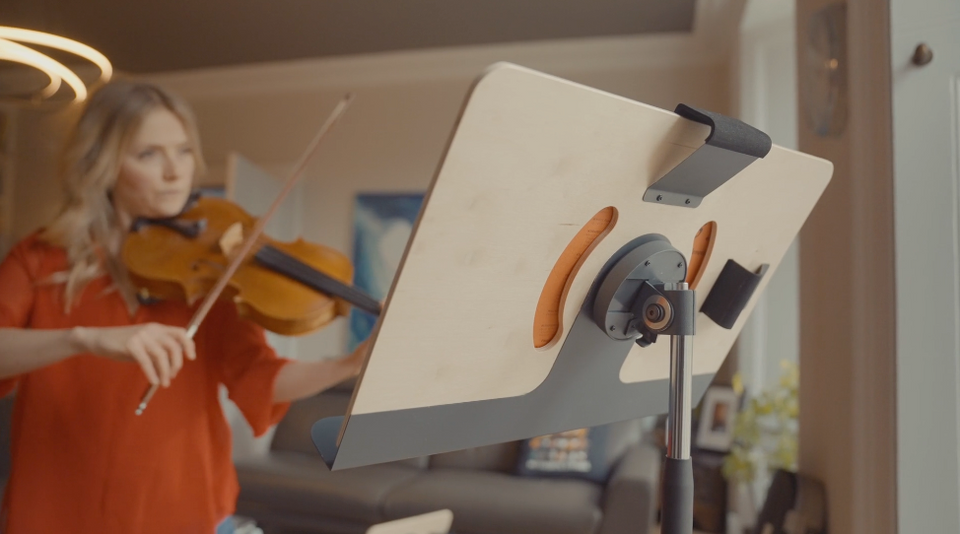 violin player with wooden music stand
