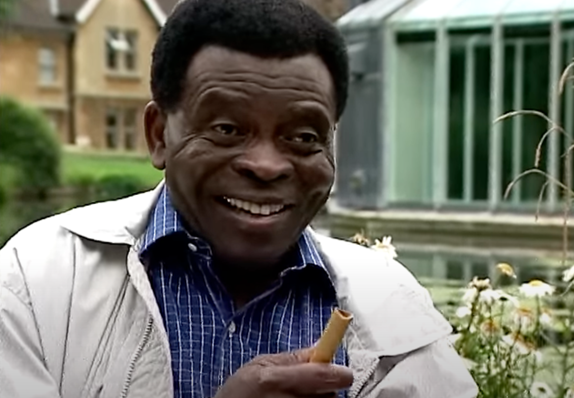 Francis Bebey Cameroonian Musician playing one note flute