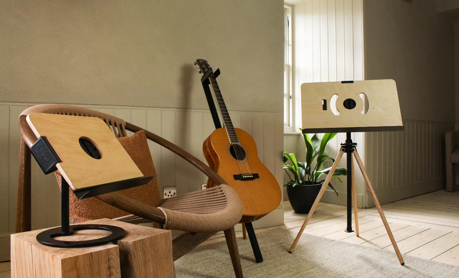 music stands in a designer home with a guitar