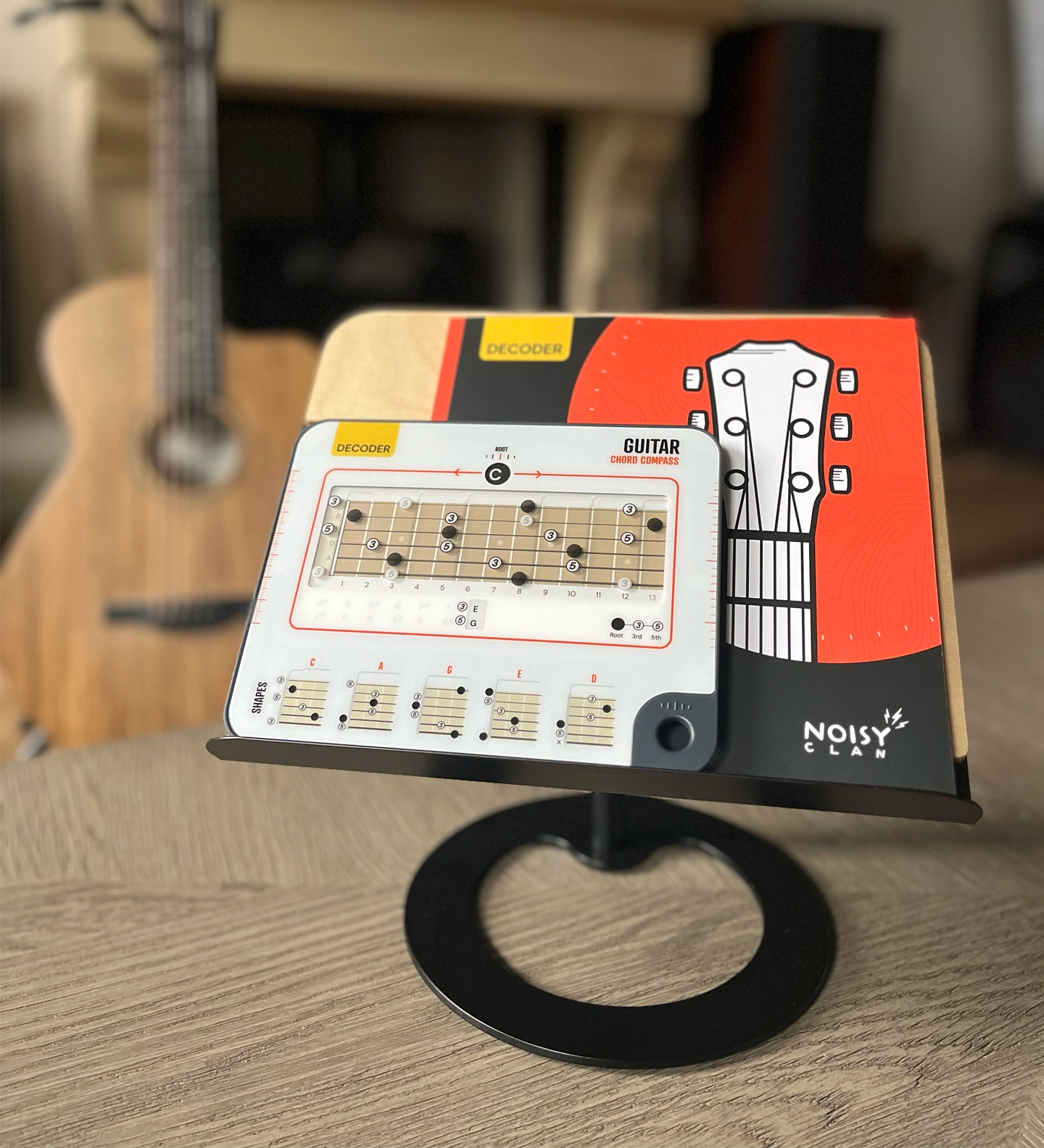 chord compass for guitar on tabletop 14